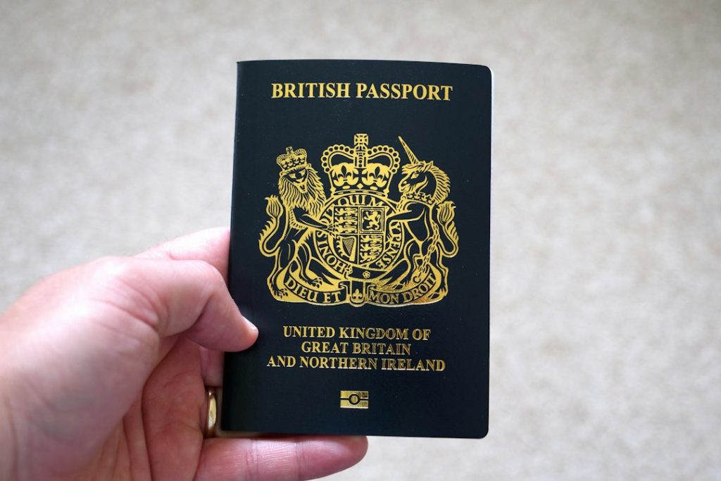 UK passport representing visa and certified translation documents